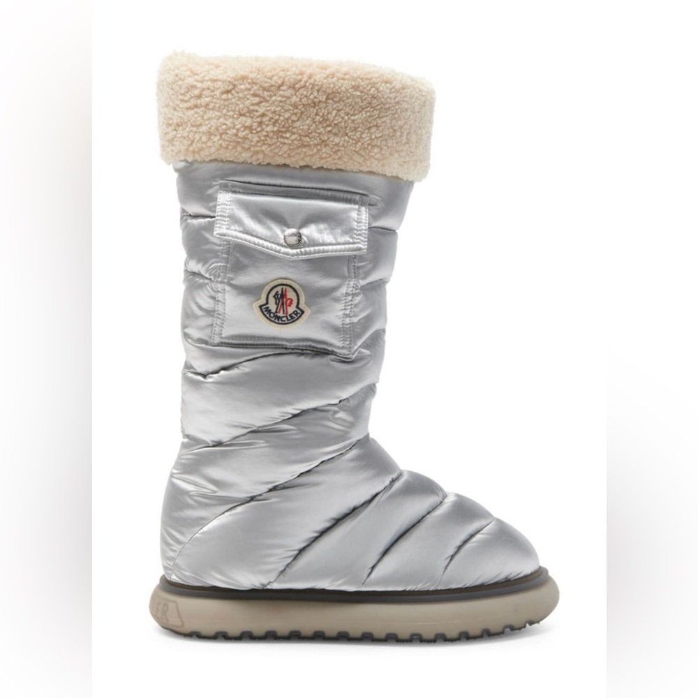 Moncler metallic snow boots NWT. Never worn. Original box & 2 LG shoes dusters.